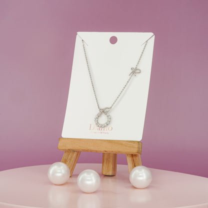 Whimsy Bow & Pearl Halo Necklace